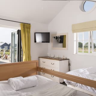 2 Specialist bedrooms with fully-profiling bed
