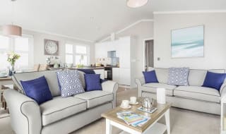 The lounge area of one of our lodges at Bude. image