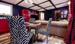 The dining area of one of our exclusive accommodations, The Rockstar. Book your holiday now! image