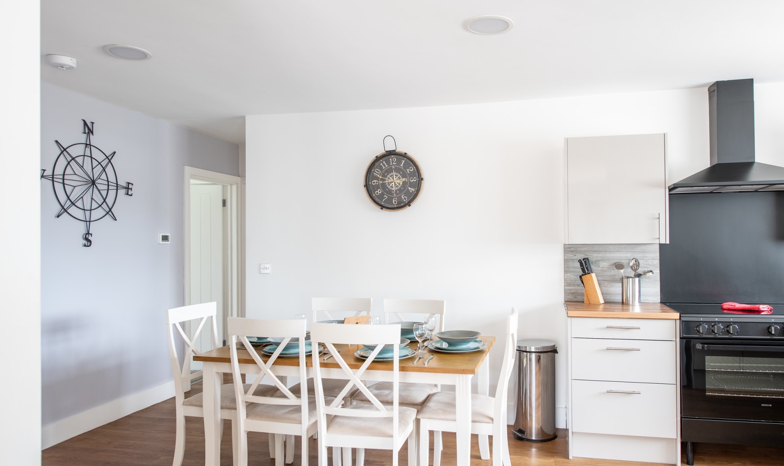 The dining area of one of our spacious static caravans at Mersea Island. Book your holiday now! image