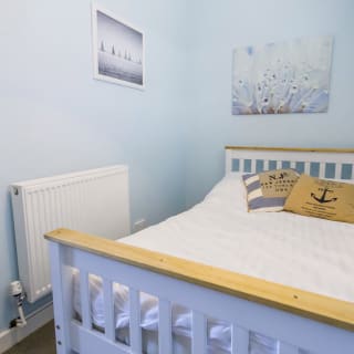 Comfortable double bed with pillows & linen included
