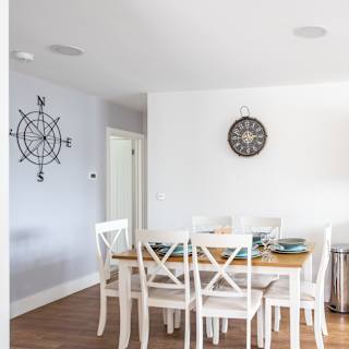 The dining area of one of our spacious static caravans at Mersea Island. Book your holiday now!