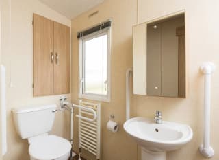 The bathroom of our accessibility adapted static caravan. The perfect way to stay. image