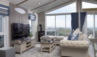 The living area of one of our spacious static caravans in St Ives. Book your holiday now! image