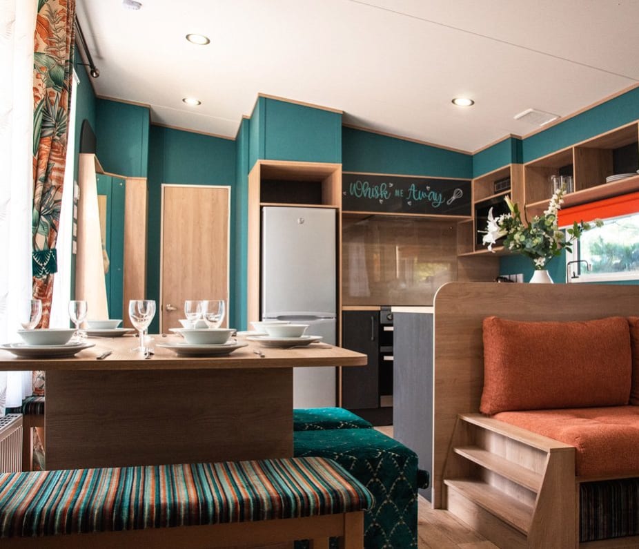 The living and dining area of our bright and spacious Exclusive accommodation, The Burst of Blue. The perfect way to stay.