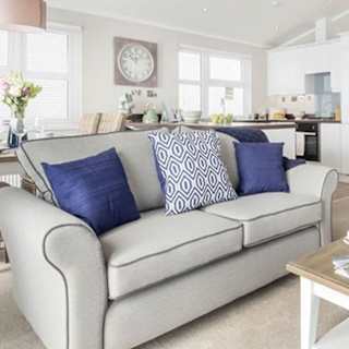 The lounge area of one of our lodges at Bude.