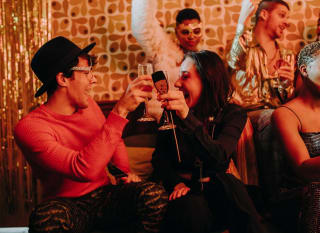 A group of people enjoying a party. image