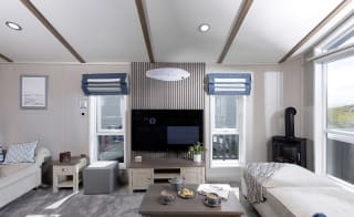 The living area of one of our spacious static caravans in St Ives. Book your holiday now! image
