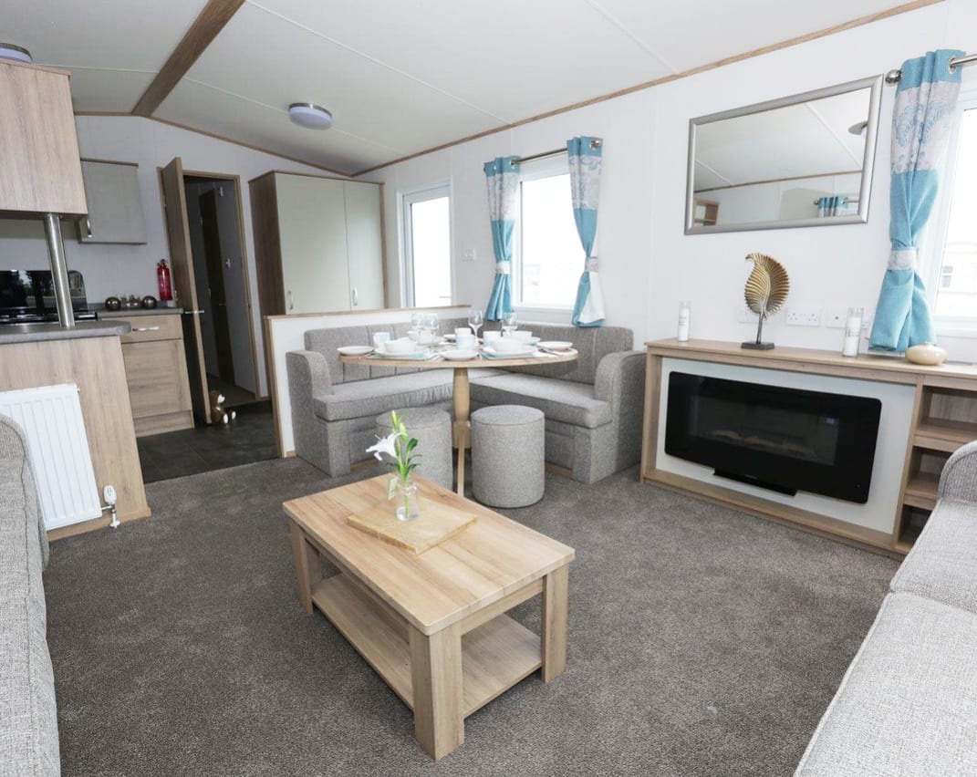 The lounge area of our bright and spacious luxury static caravan. The perfect way to stay.