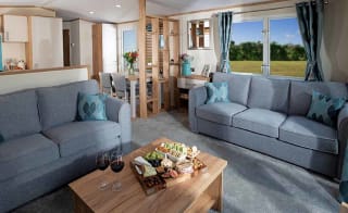 The lounge area of our bright and spacious luxury static caravan at St Helens holiday park. The perfect way to stay. image