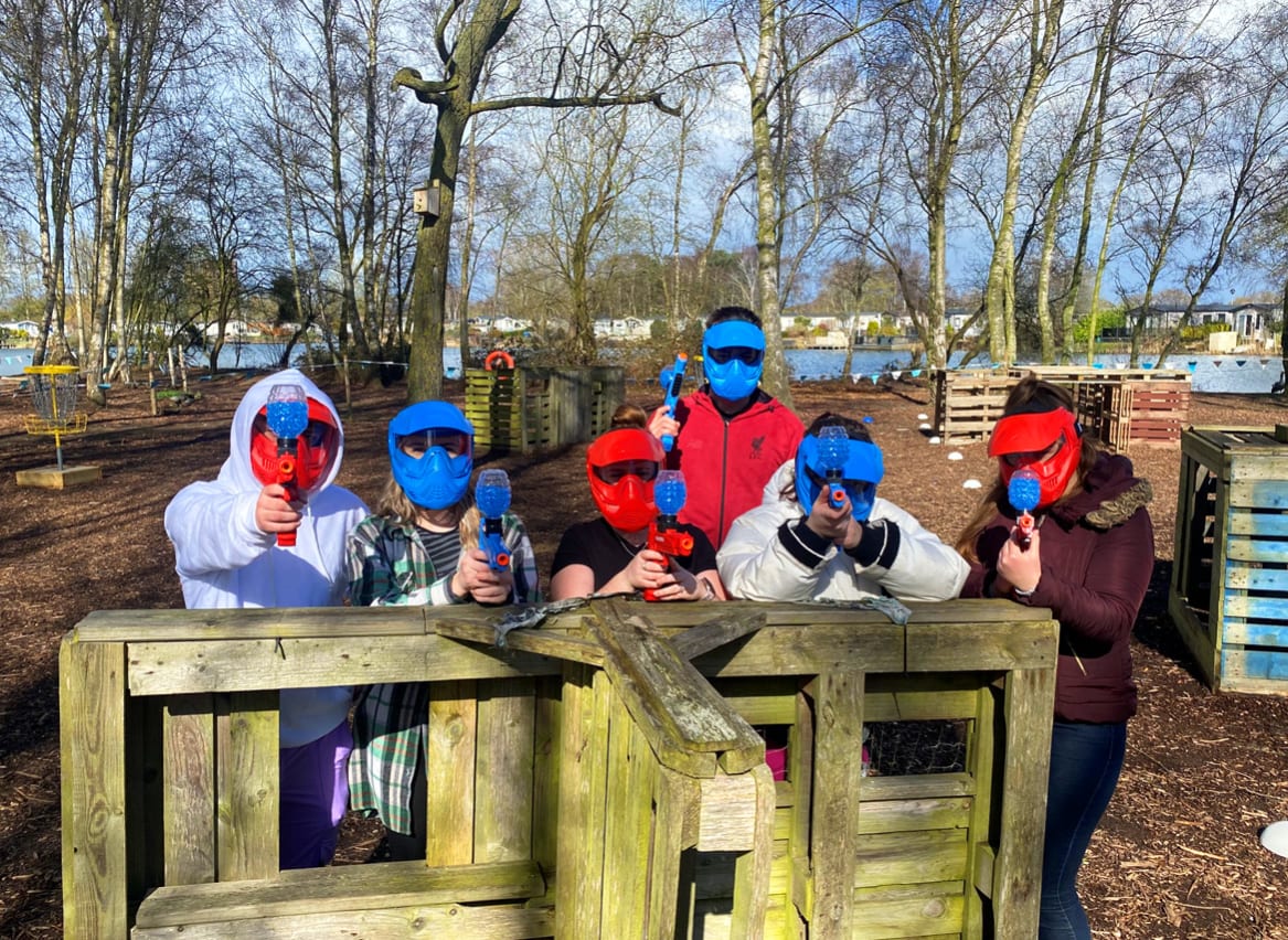 A group of people taking part in our awesome on-site activity, Gel Blasters. Book your space today! image