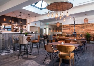 Interior of our Retallack Lookout Bar and Eatery overlooking our FlowRider facility.