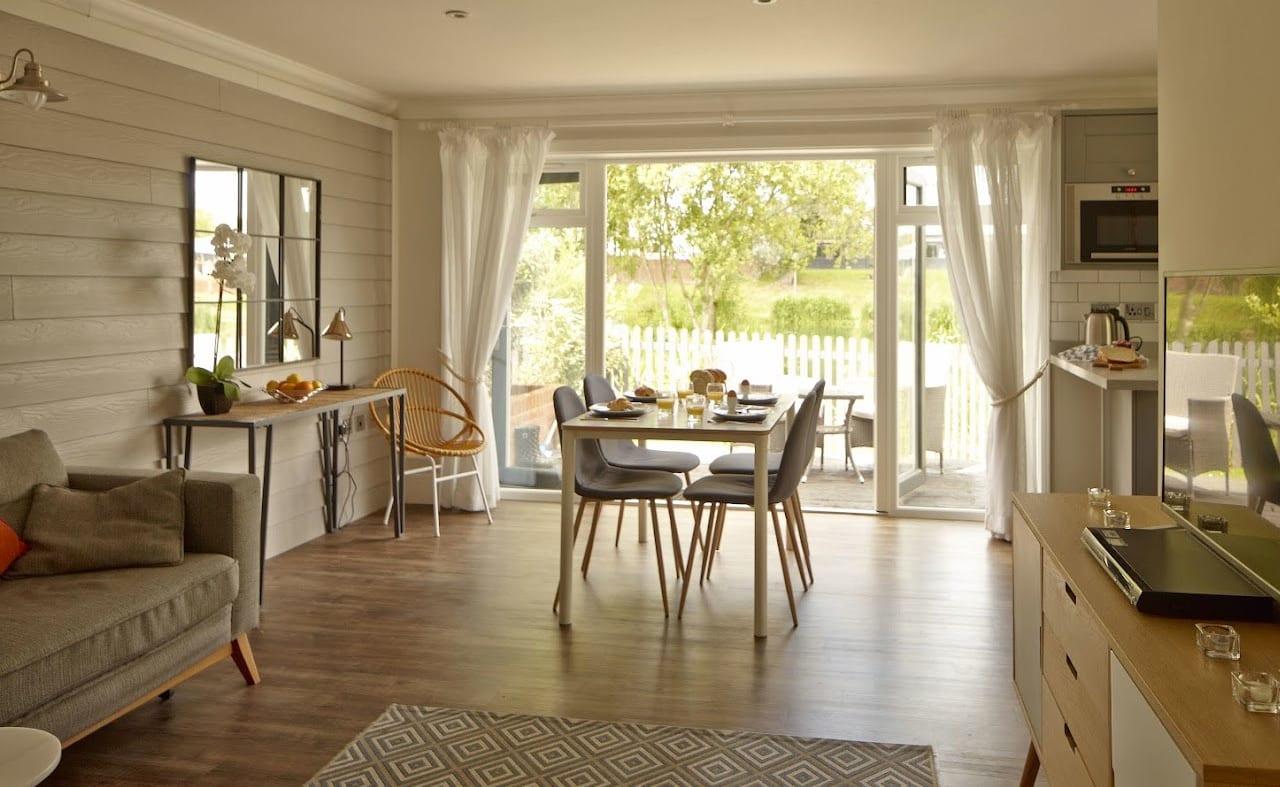 The lounge area of our bright and spacious luxury island cottage. The perfect way to stay. image