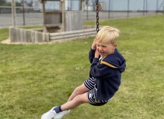 A young boy playing in the adventure playground at our park in Lincolnshire, Cleethorpes Pearl. Book your break today! image
