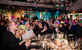 A group of people enjoying a party at one of our holiday parks. image