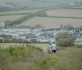 Couple on their walk near Bude Holiday Park during the autumn months.
