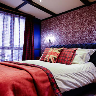 The master bedroom of one of our exclusive accommodations, The Rockstar. Book your holiday now!