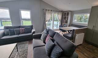 The living and lounge area of one of our exclusive accommodations, The Seaview Lodge. Book your holiday now! image