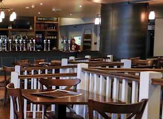 The interior The Sandpiper Restaurant and Sports Bar at our North Wales Holiday Park, Golden Sands. image