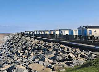 A summer's day overlooking the beach by our static caravan holiday park Golden Sands, North Wales. image
