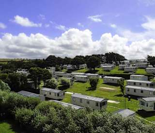 A drone image of the caravans at one of our parks in Cornwall, Newquay Bay.