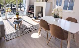 The lounge area of The Lakehouse at The Lakes Rookley. The perfect way for the family to stay. image
