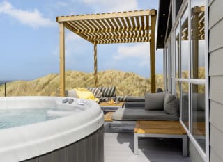 A bright sunny day at our St Ives park with stunning views from our hot tubs. image