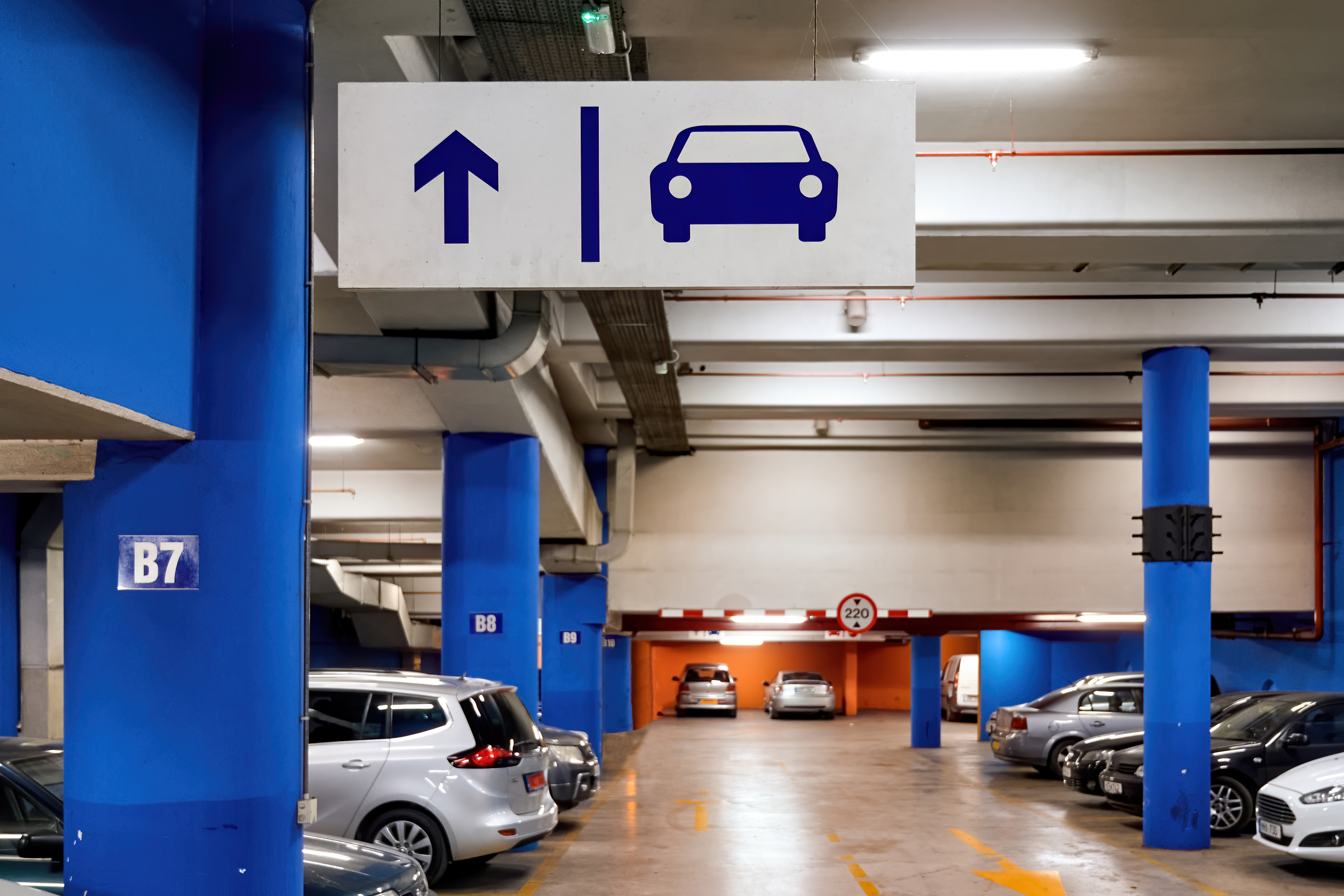Modern parking garage with available spots