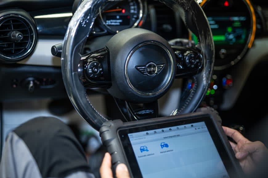 unlock a steering wheel lock