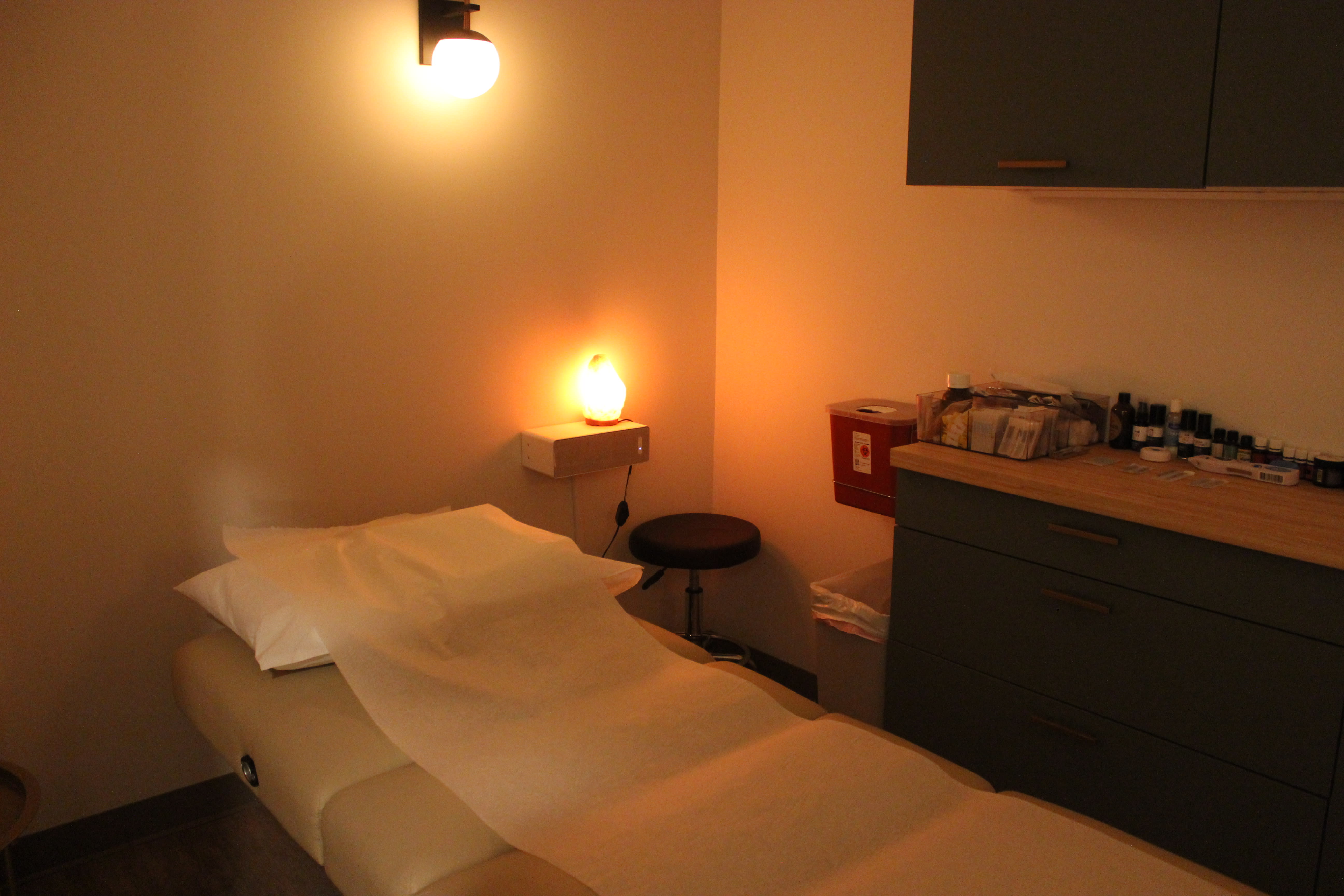Treatment room with warm lighting