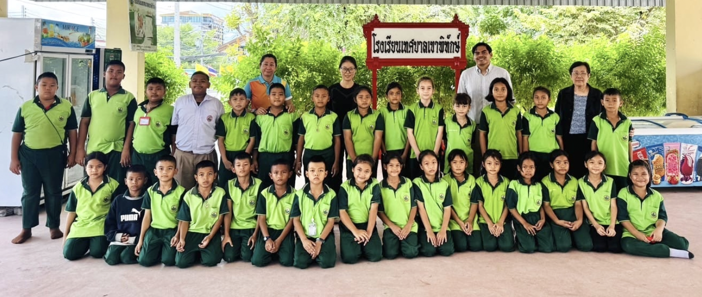 Englishfully team with students at a local school partnership in Thailand