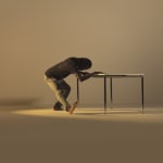 Side-to-side desk squats