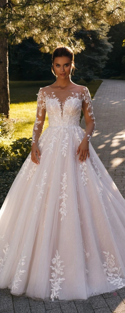 Robe de mariée princesse manches longues dentelle illusion jupe tulle volumineuse - vue de face
