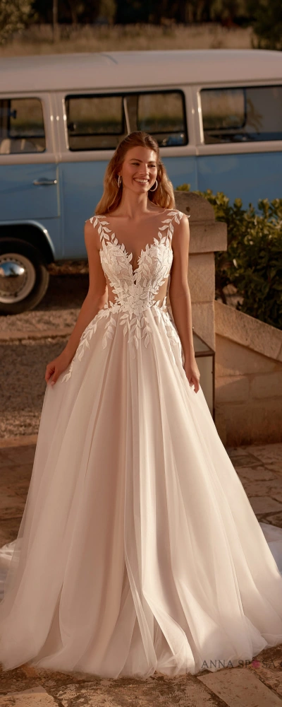 Robe de mariée bohème Minelly manches longues illusion dentelle végétale chez Monica Mariage Toulouse