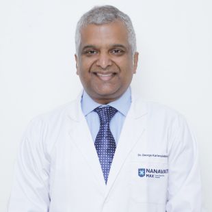 Dr . George Karimundackal