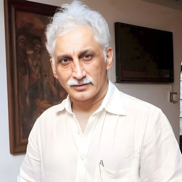 Dr Shailesh Raina