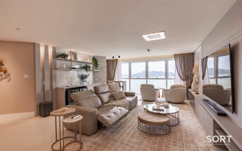 Sala de estar Apartamento Vista Mar no Edifício Infinity Coast