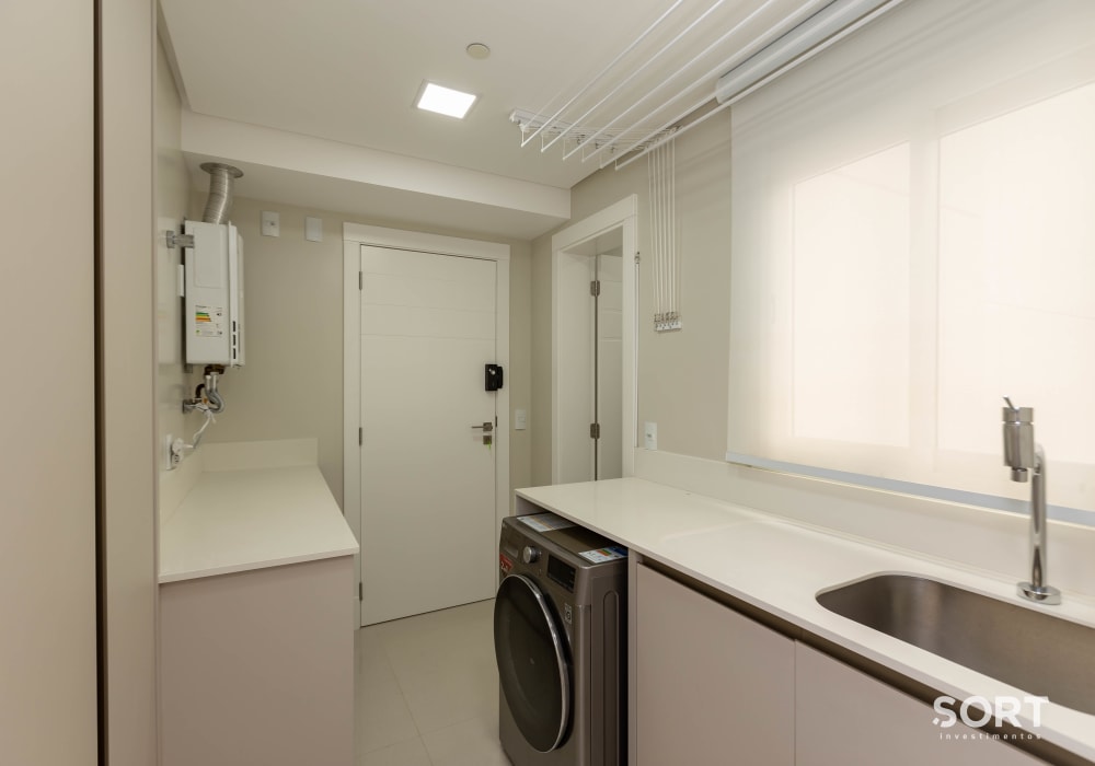 Área de serviço Apartamento Vista Mar no Edifício Infinity Coast