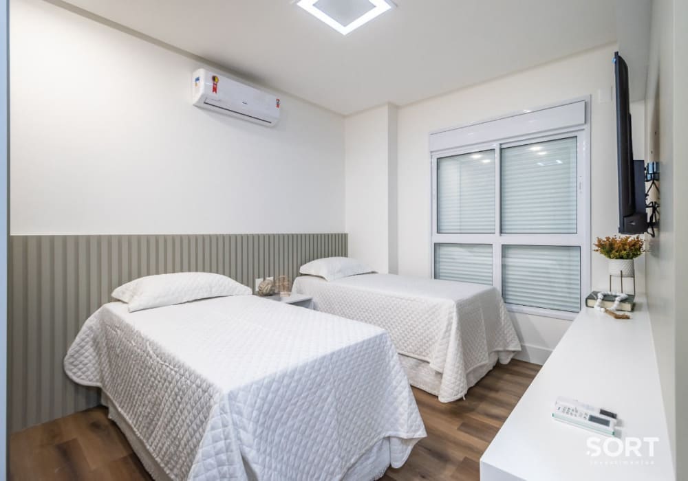 Suíte Apartamento Quadra Mar no Edifício Brescia