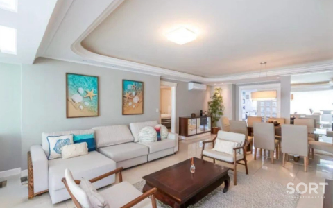 Sala de estar Apartamento no Edifício Villa Cora frente mar