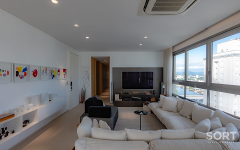 Sala de estar Apartamento no Apogee Cechinel Frente-Mar na Barra Sul