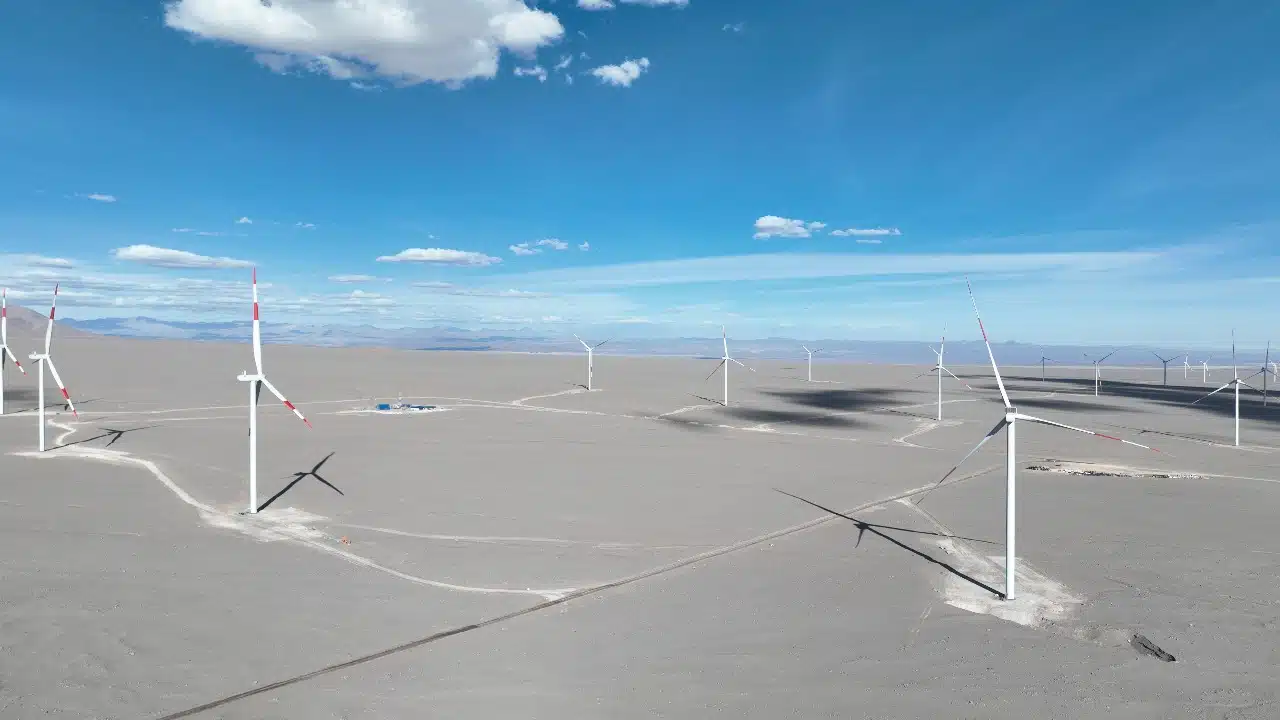Wind turbines standing tall against desert landscape in northern Chile's Antofagasta Region