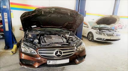 QALUNYA Auto Maintenance Workshop — photo 1 of 3
