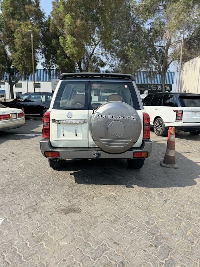 AUTO CHECK INTERNATIONAL — photo 1 of 2