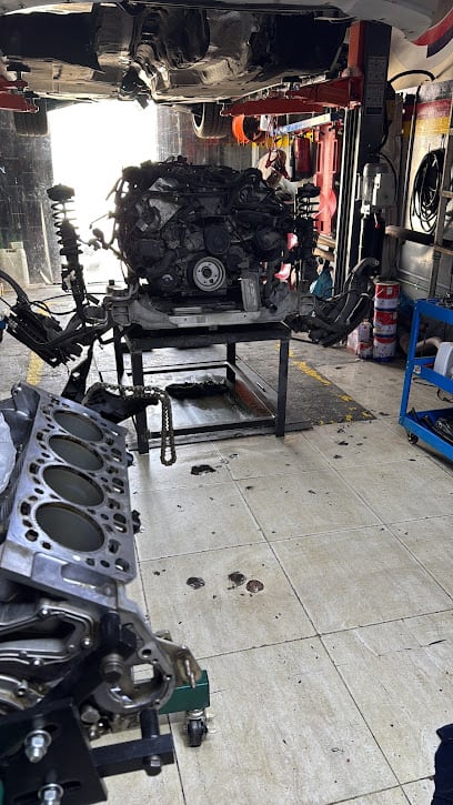 ورشة + كراج بي ام دبليو البريمي garage BMW fast motor line — photo 1 of 4