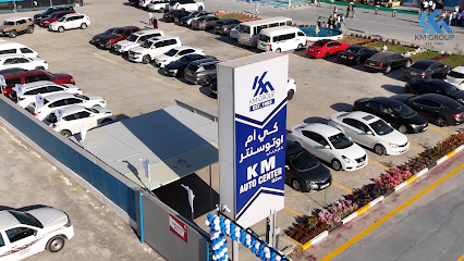 KM Auto Center (Tesla Approved Bodyshop)