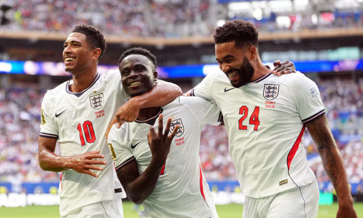 Saka hat-trick secures England win over France