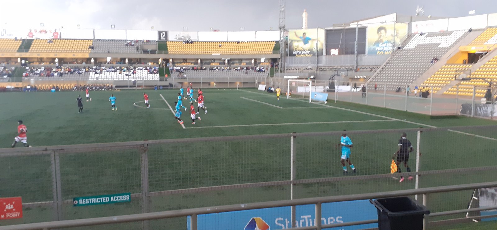 Entebbe UPPC and Police FC players in action at Hamz Stadium, Nakivubo
