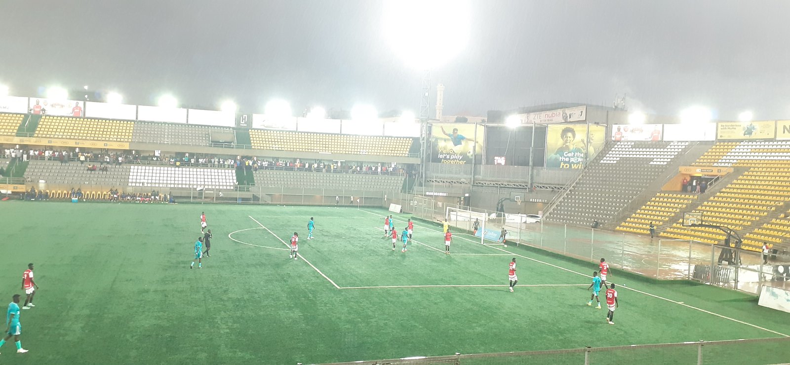 The floodlights come on over Hamz Stadium during Entebbe UPPC vs Police FC