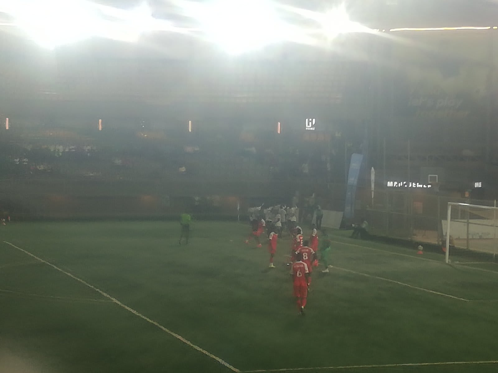 Kataka players in white celebrate their 1st goal
